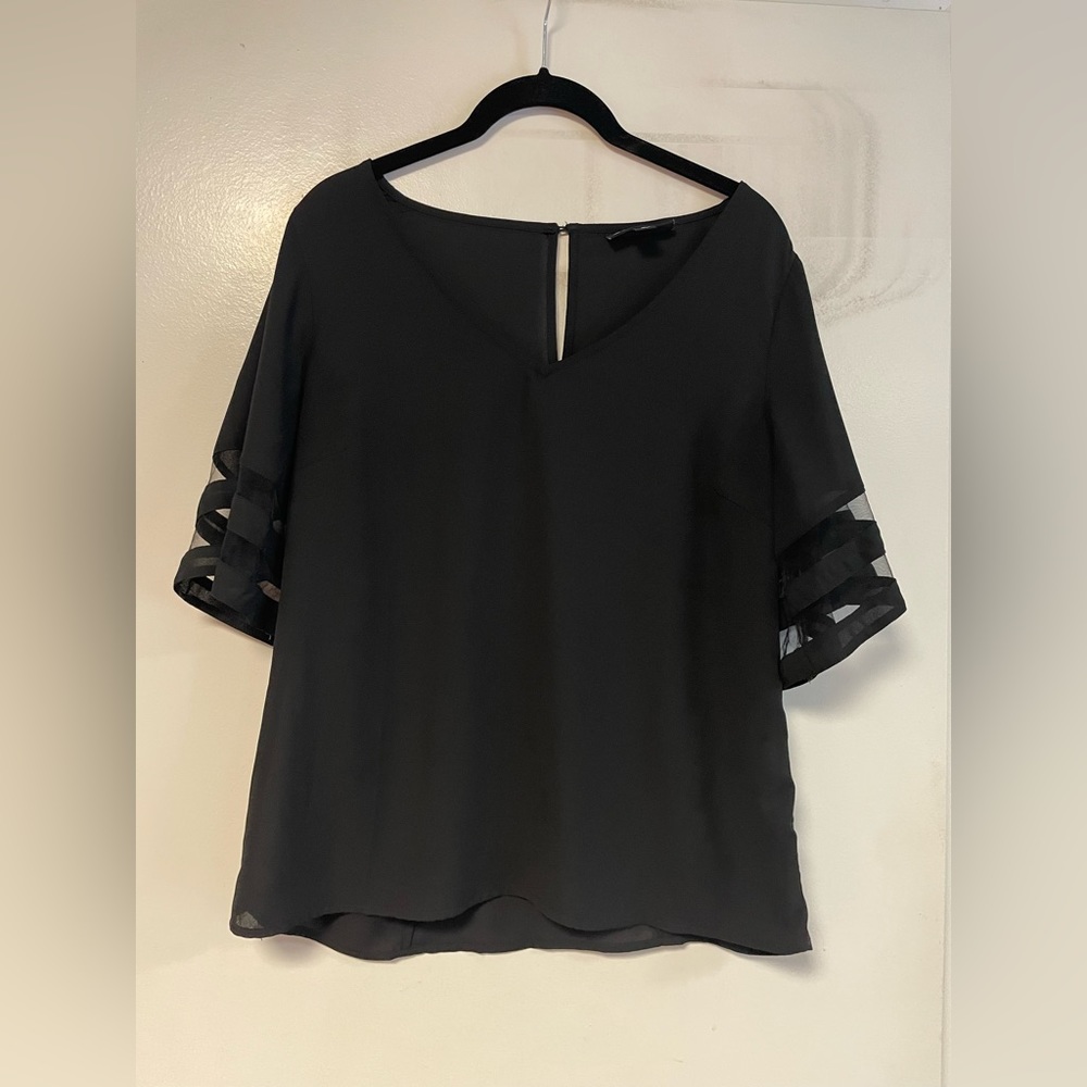 Black blouse with sheer sleeve.  Size Medium.